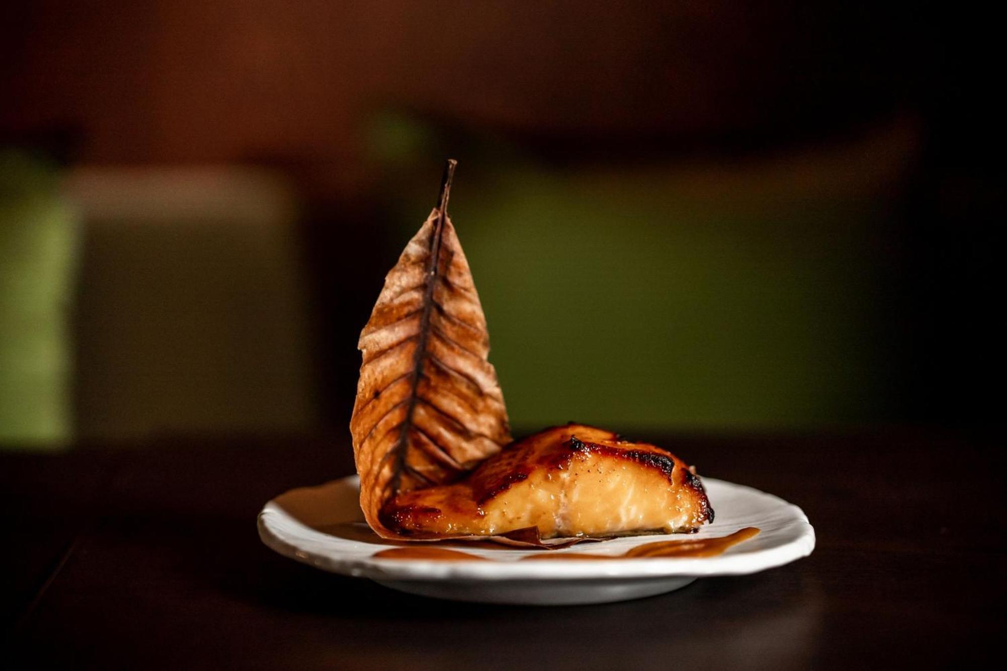 The Dubai Edition Екстер'єр фото Smoked and grilled salmon
