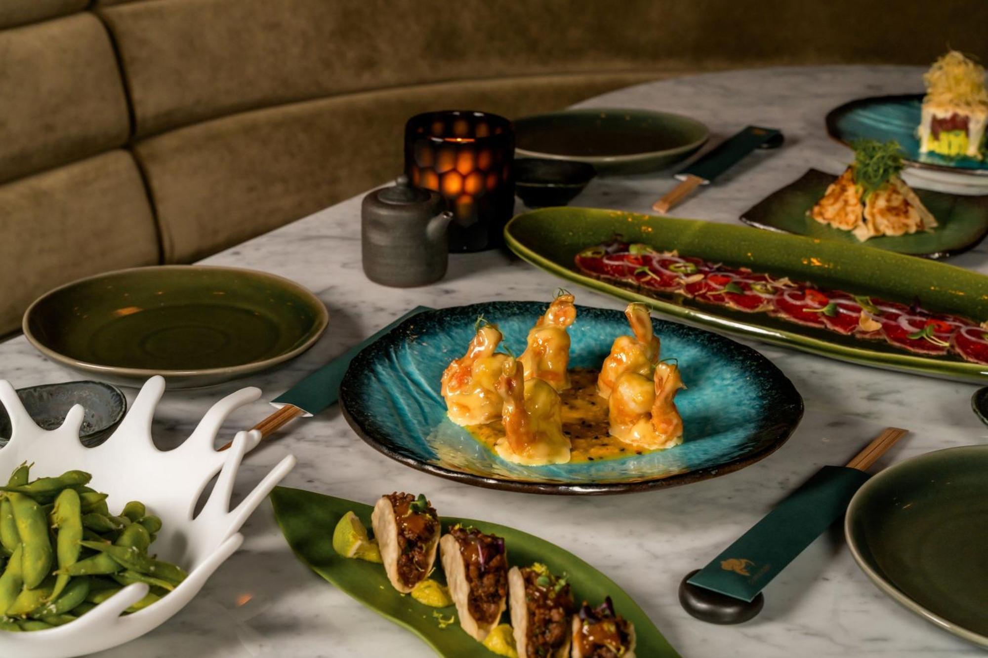 The Dubai Edition Екстер'єр фото A selection of dishes at the restaurant
